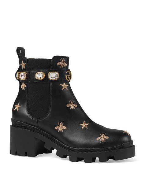 black gucci boots with stars